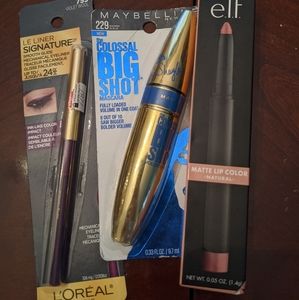 Purple eye liner, blue mascara, matte natural lip color